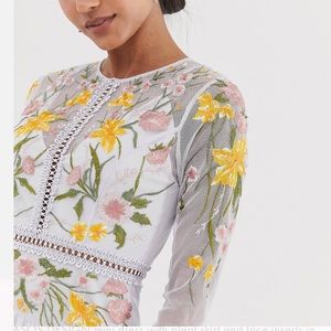 NWT ASOS design mini dress with pleat skirt and lace floral inserts